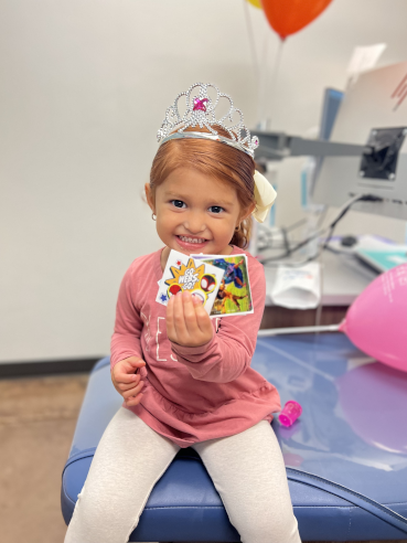 Caring for Dental Crowns Happy Meridian Patient with Prizes