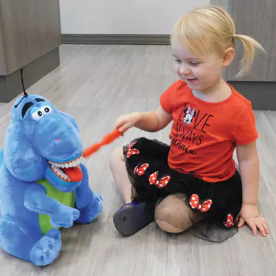 Meridian Patient Learning About Dental Health