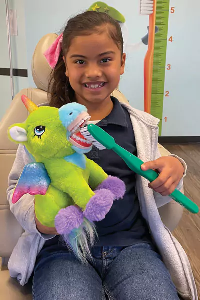 Girl with Animal Patient with stuffed animal
